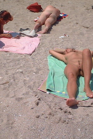 A French girl going topless at the Copacabana